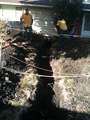 Tracy plumbers install a sewer line